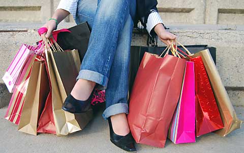 legs with shopping bags